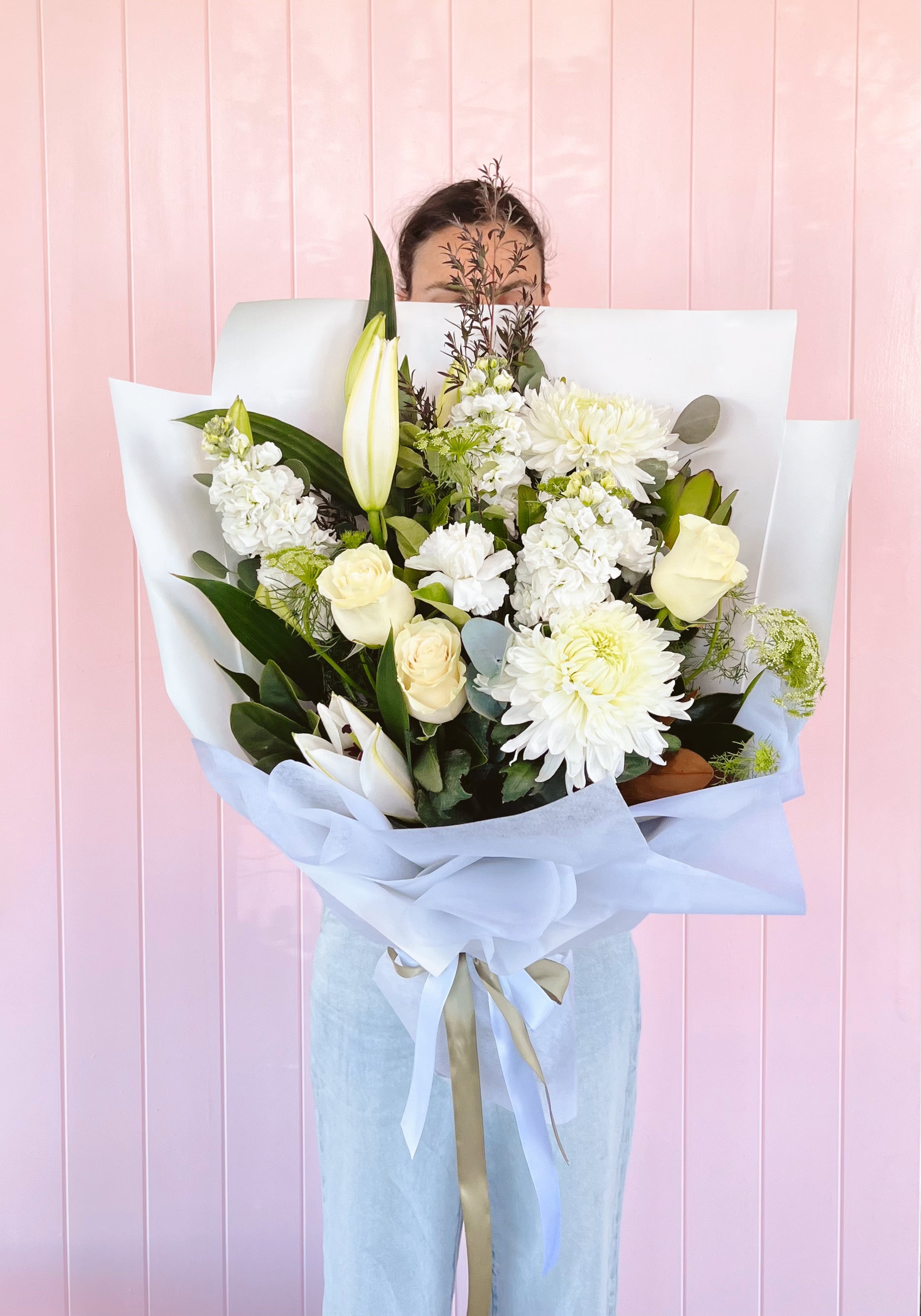 Send gentle, heartfelt sympathy flowers with our With Love Sympathy Blooms. Freshly arranged and available for same-day delivery in Brisbane.
