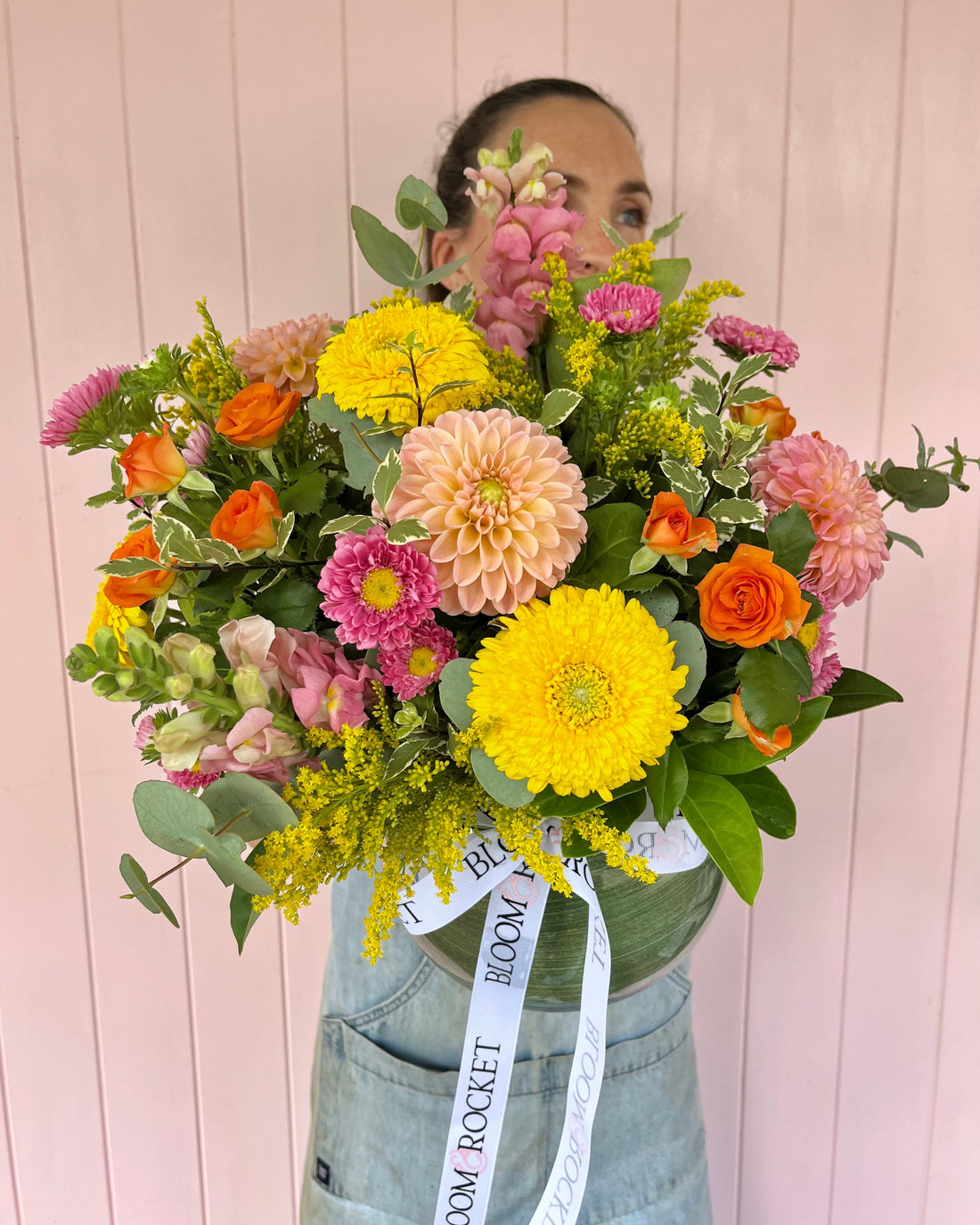 Bright pastel flower fishbowl arrangement featuring seasonal florals. Bloom and Rocket Florist, Brisbane.