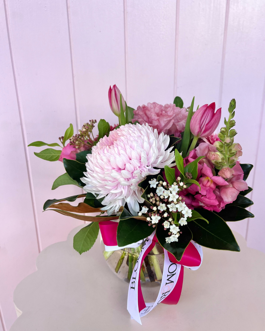 Petite pink flower fishbowl vase arrangement. Bloom and Rocket Florist Brisbane