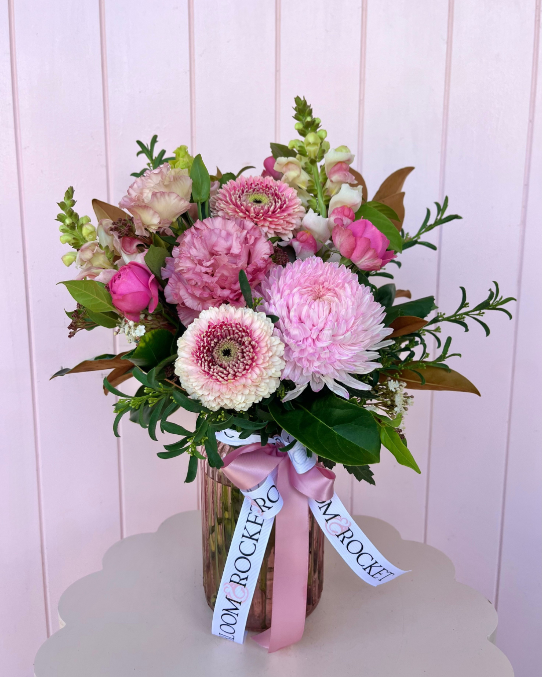 Pink small vase arrangement with a selection of seasonal flowers arranged in a clear vase. Bloom and Rocket Florist, Brisbane. Taringa Florist.