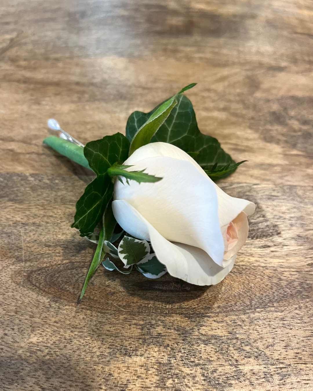 Premium luxury rose boutonniere with filler foliage. Perfect for weddings, formals and events. Bloom and Rocket Florist, Brisbane