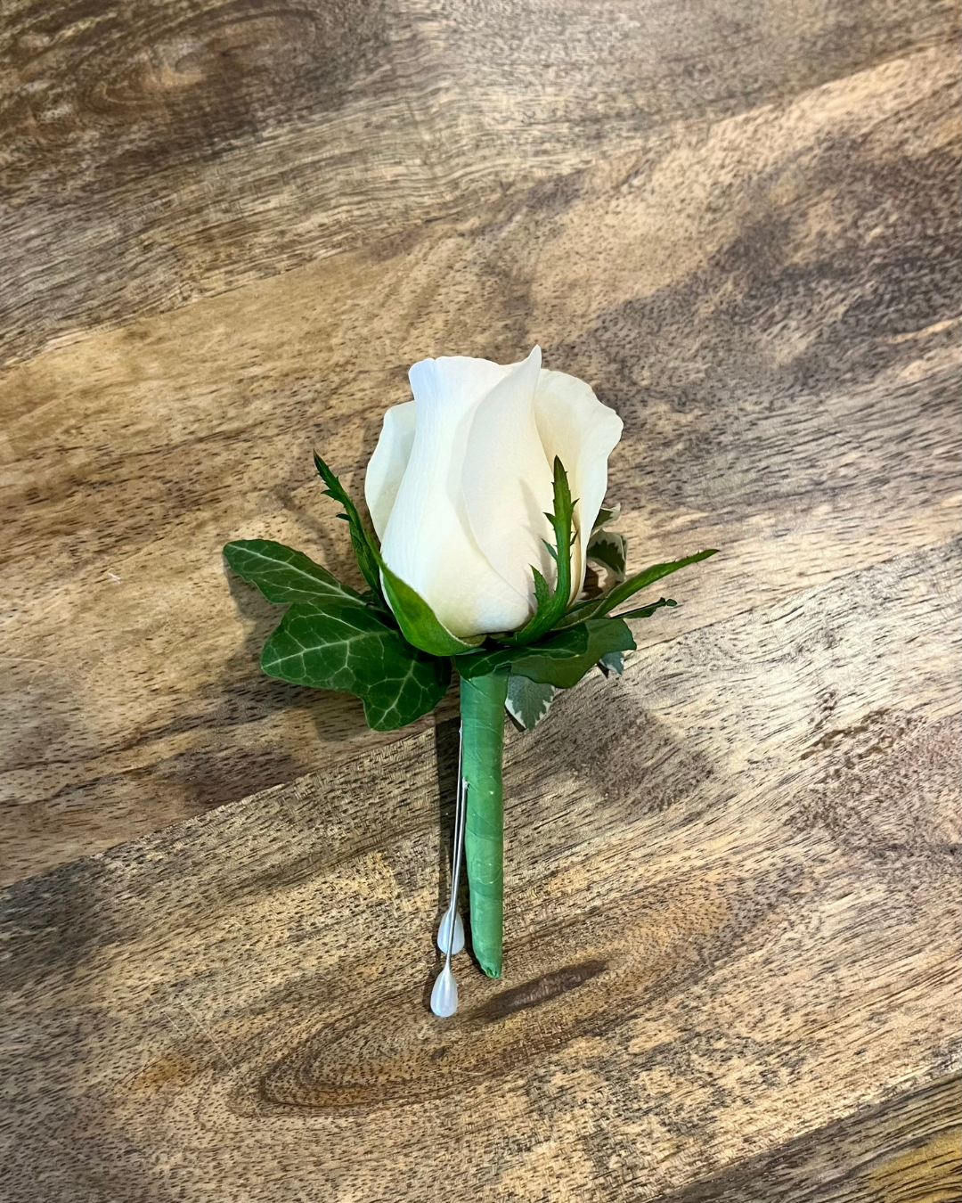 Premium luxury rose boutonniere with filler foliage. Perfect for weddings, formals or events. Bloom and Rocket Florist, Brisbane.