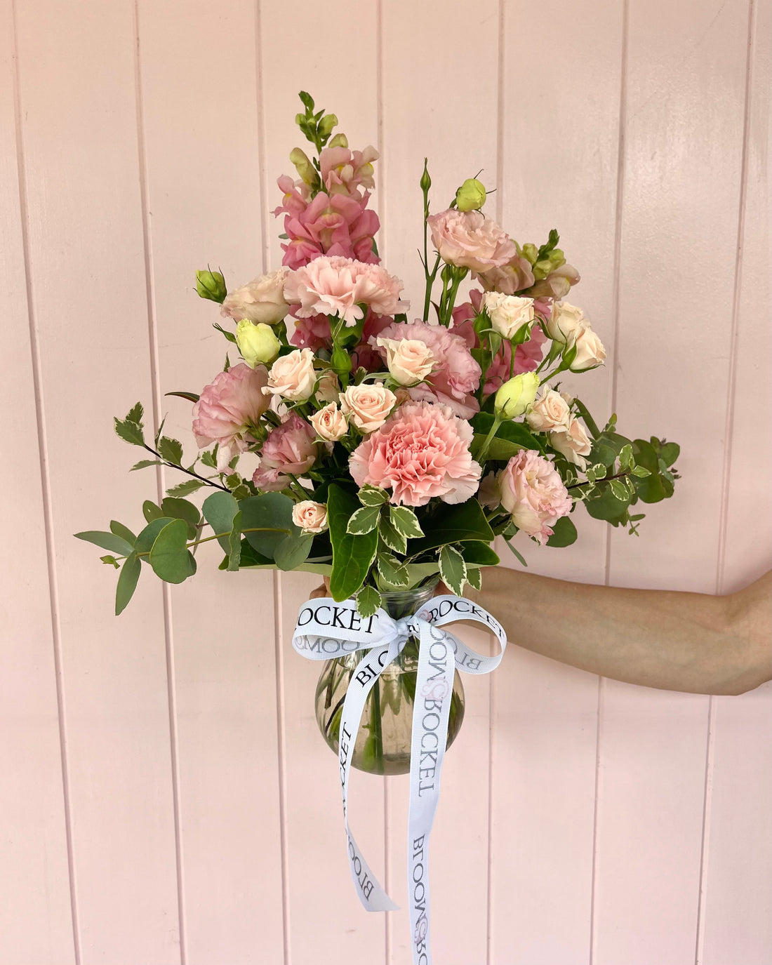Small soft pink flower vase arrangement featuring seasonal florals arranged in a clear glass vase. Bloom and Rocket Florist, Taringa. Brisbane Flower Delivery. Same day delivery available.