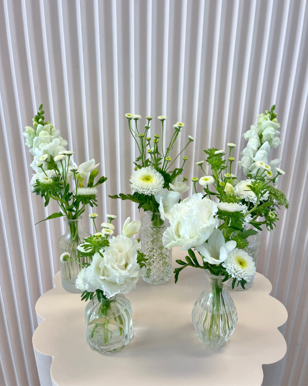 White flower bud vases. Perfect for weddings or events. Bloom and Rocket Florist, Brisbane.