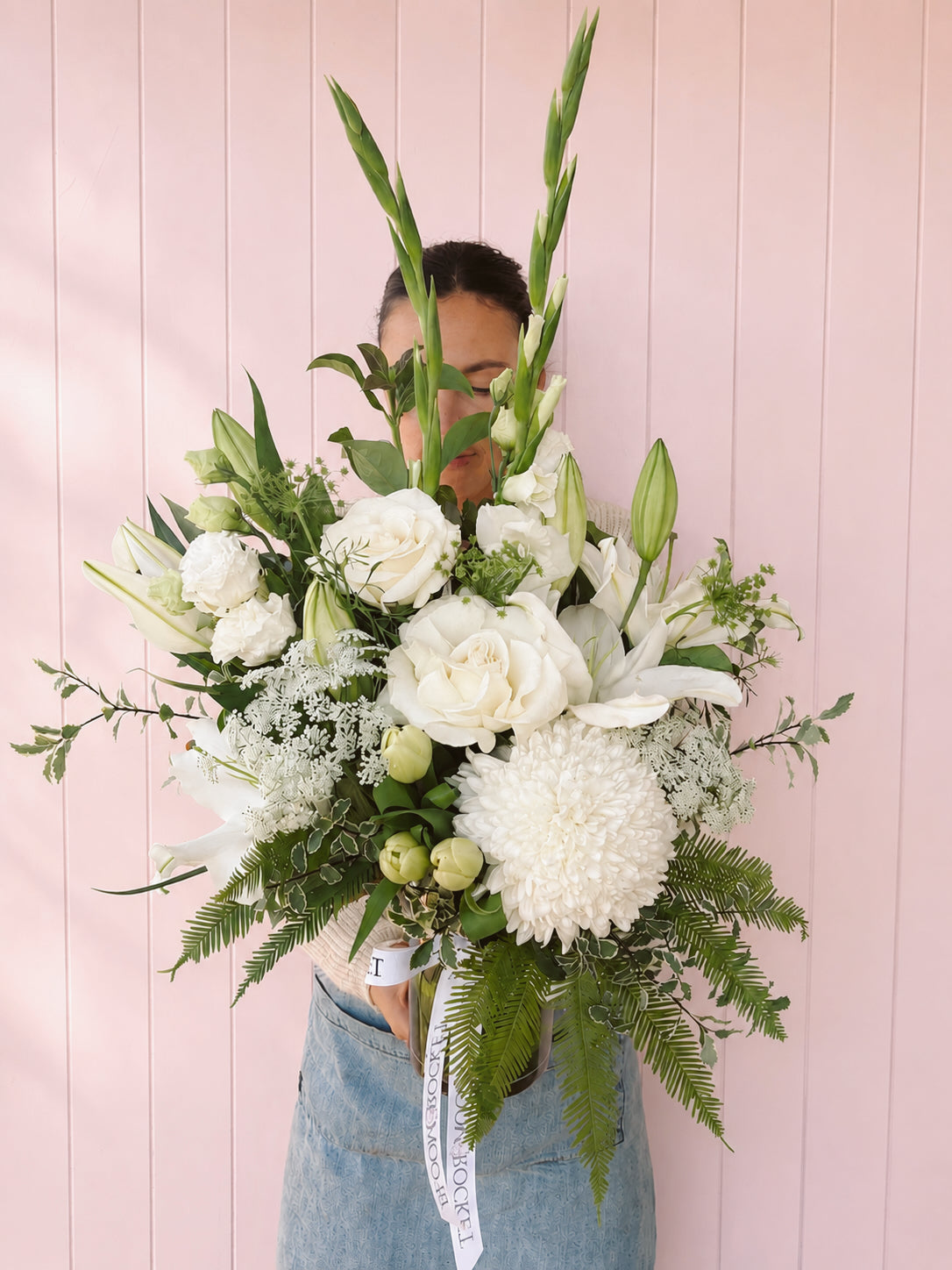 White and green vase arrangement for sympathy and funeral. Bloom and rocket florist Brisbane 