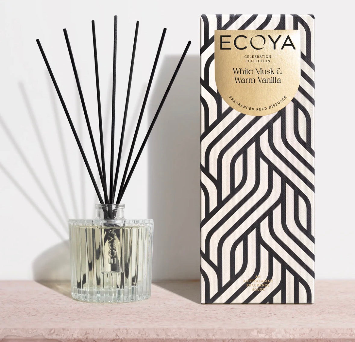 Ecoya diffuser with black reeds and patterned box on a light background. Bloom and Rocket Florist. Brisbane Flower and Gift delivery.