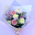 Pastel bloom bouquet featuring seasonal flowers in white, pink, lemon and lilac. Bloom and Rocket Florist Brisbane.