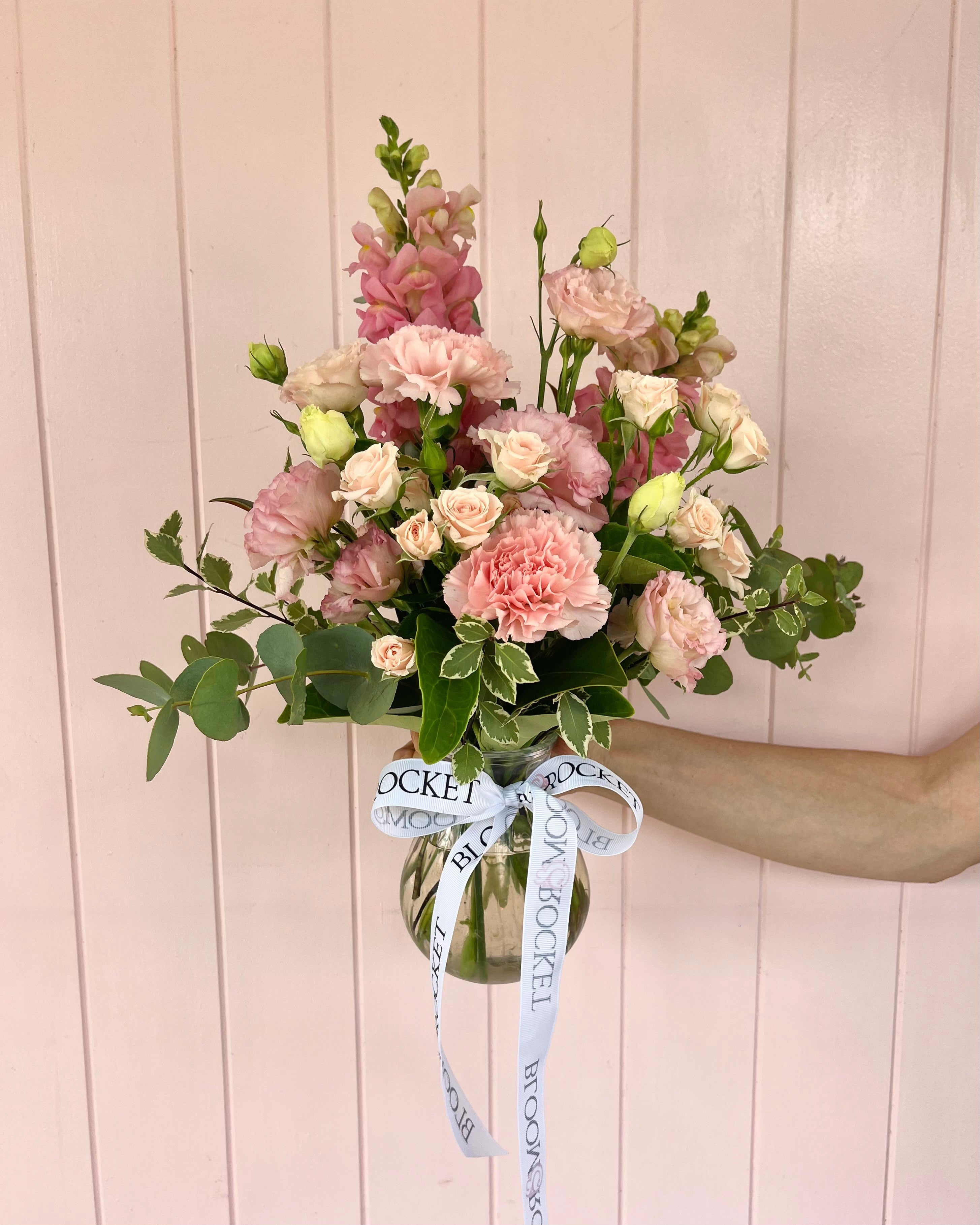 Small soft pink flower vase arrangement featuring seasonal florals arranged in a clear vase. Bloom and Rocket Florist, Taringa. Brisbane Flower Delivery.